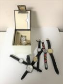 A box containing two lady's Ingersoll wristwatches, one in box,