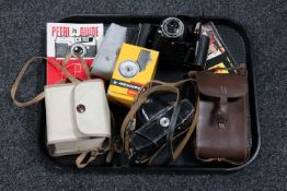 Vintage cameras and accessories to include a Kodak Brownie Twin 20, Petri 7S,