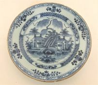 An 18th/19th century Delft plate,
