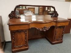 A Victorian mahogany mirror backed serpentine fronted twin pedestal sideboard, width 197 cm.