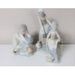 Three Nao figures; lady filling urn at well,