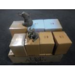 A box containing sixteen Leonardo Collection Out of Africa elephant figures
