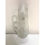 An antique etched glass jug depicting a stag in woodland CONDITION REPORT: In good