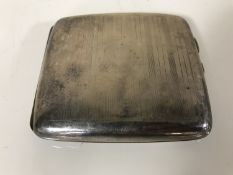 A silver cigarette case, Birmingham 1919, 101.3g.