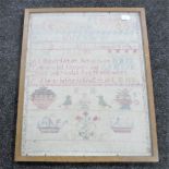 A 19th century framed alphabet sampler