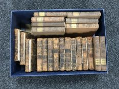 A box containing thirteen antique leather bound volumes; A Curious Collection of Travels,