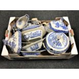 A box of antique blue and white willow pattern china including tureens, gravy boat,