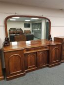 A Victorian mahogany inverted breakfront mirror back sideboard,