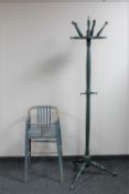 A twentieth century painted child's high chair and a painted hat and coat stand