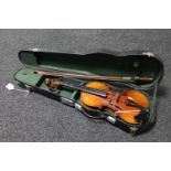 A twentieth century half sized violin in case with bow