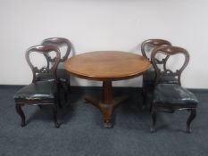 A circular Victorian mahogany pedestal breakfast table together with four Victorian mahogany chairs