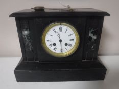 A Victorian slate and marble mantel clock with enamel dial,