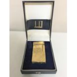 A Dunhill gold plated lighter,