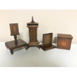 Three pieces of Victorian inlaid mahogany treen to include matchbook holder on stand,