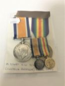 Two WWI medals comprising British War Medal and Victory Medal with accompanying miniatures