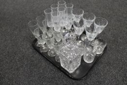 A tray of assorted glass ware to include a lead crystal whisky decanter together with three lead