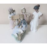 Four Nao figures of girls; girl with violin, girl with cello,