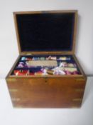 A Victorian pine workbox containing four lift out trays of sewing items and threads