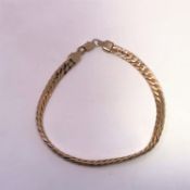 A 9ct gold bracelet, 18cm CONDITION REPORT: 5.