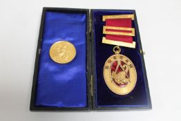 A gilt and enamelled Masonic Durham medal and a silver-gilt Masonic medallion