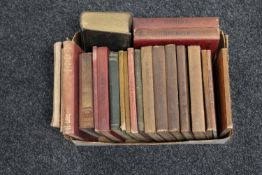A box containing antiquarian volumes,