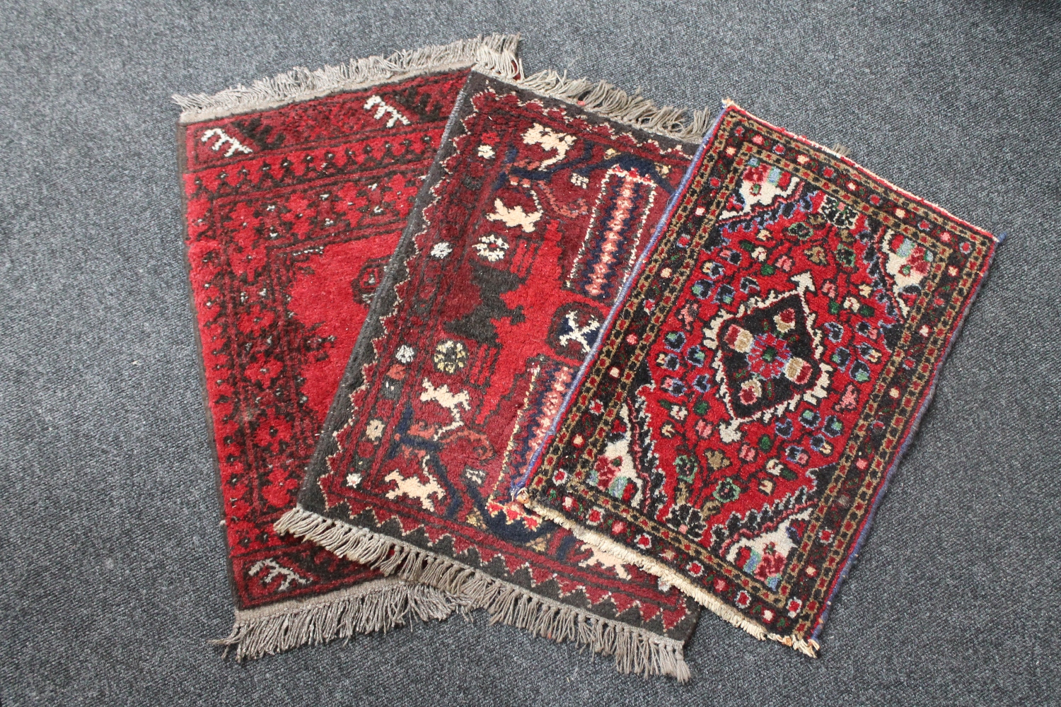 Three fringed Persian prayer rugs