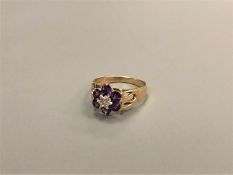 A 9ct gold amethyst cluster ring, size P1/2 CONDITION REPORT: 2.