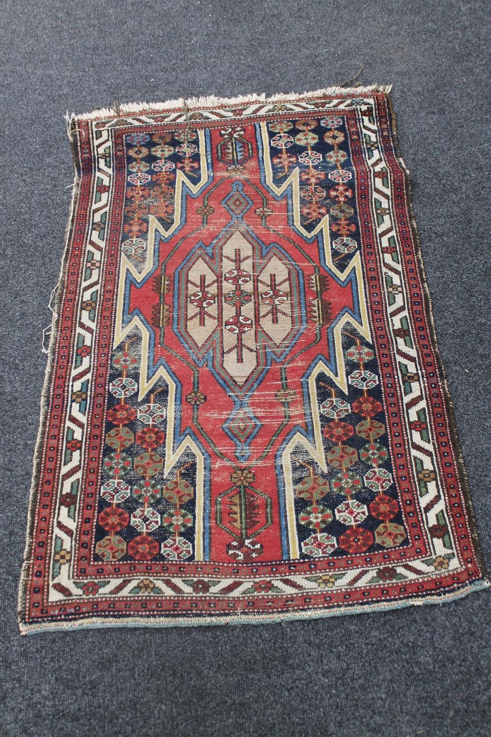 An antique Kurdish Mazlaghan rug,