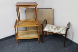 A folding card table together with a continental oak two tier tea trolley,