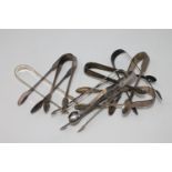 Eight pairs of Georgian silver sugar tongs,