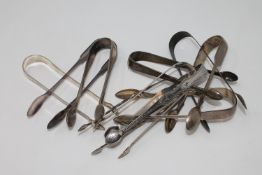 Eight pairs of Georgian silver sugar tongs,