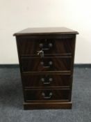 A mahogany two drawer filing chest