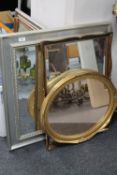 A square silvered bevelled mirror together with two gilt framed mirrors