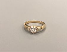 A 9ct gold CZ ring, size O CONDITION REPORT: 2.