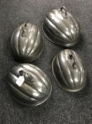 Four antique pewter food covers