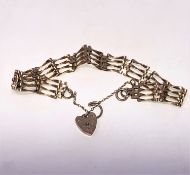 A 9ct gold padlock bracelet CONDITION REPORT: 5.