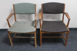 A pair of mid twentieth century Danish teak armchairs