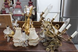 A gilt metal six way light fitting with glass bowls and drops together with a further brass and
