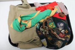 A tray containing cub scout uniform and ephemera including tunic, neckerchief's, cap,