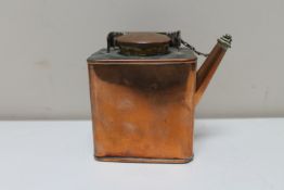 An antique copper lamp lighter's flask