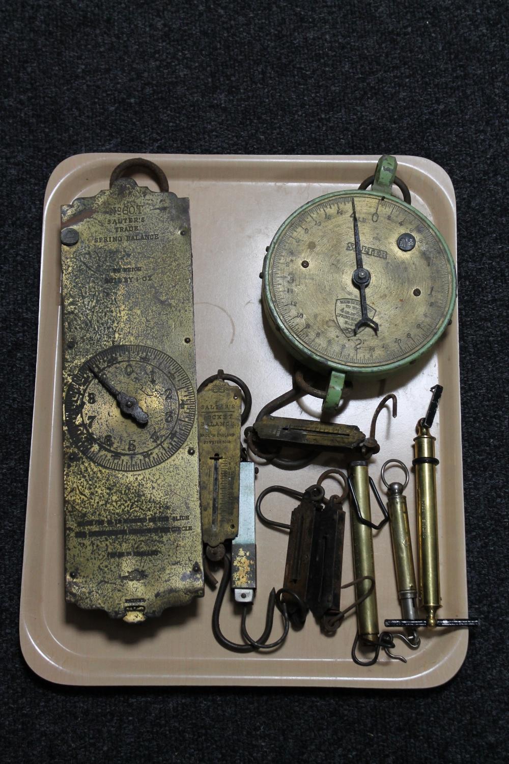 A tray of a collection of seven assorted pocket scales together with a Salter's No 60 T trade