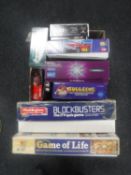 A box of assorted board games, Airfix modelling kits,