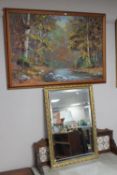 A framed oil on board, river through a wooded landscape, by J.