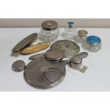 A box of dressing table pieces to include : six piece silver backed dressing table set,