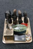 A tray containing cards, hardwood tourists figures, brass tea caddy, assorted tins and match boxes,