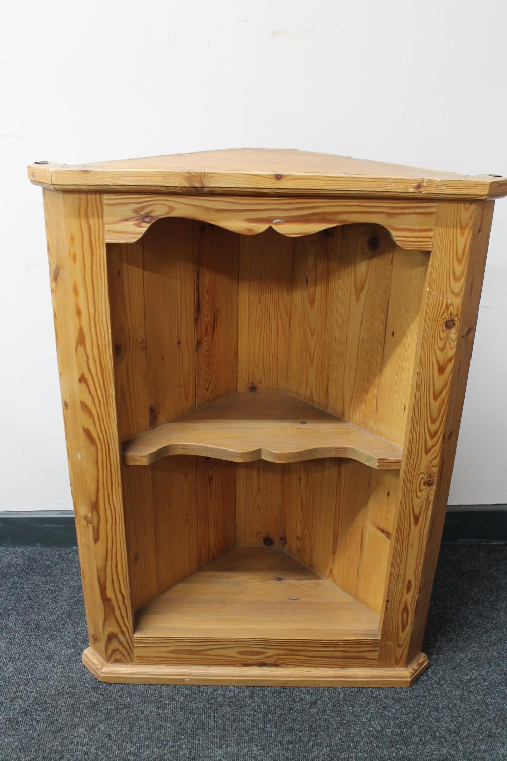 A set of pine open corner shelves