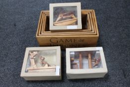 A set of four graduated wooden Game of Thrones caddies together with three boxed wooden hand made