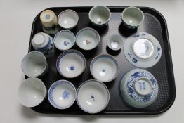 A tray of sixteen pieces of antique and later Chinese export porcelain tea bowls, rice bowls,