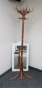 A bentwood hat and coat stand together with a painted hall mirror