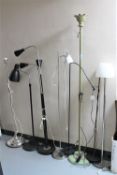 Eight assorted metal floors lamps (continental wiring)